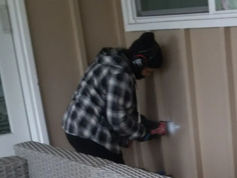 Professional electrician installing an exterior outlet in Toronto